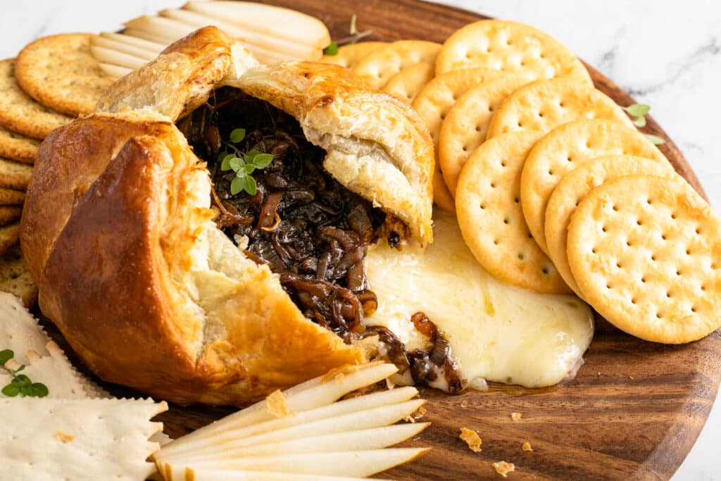 flaky crust of Baked Brie With Balsamic Caramelized Onions