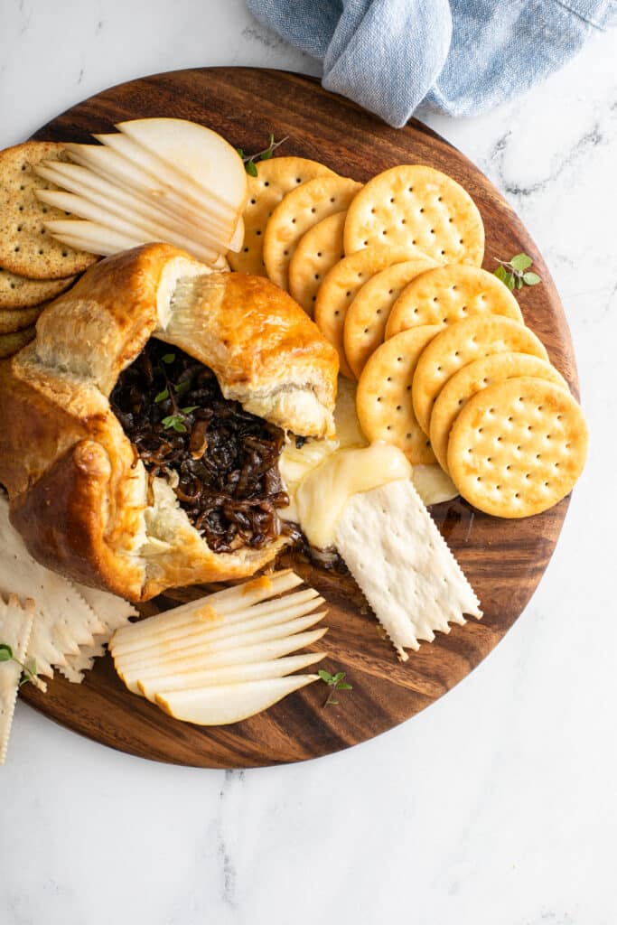 flaky crust of Baked Brie With Balsamic Caramelized Onions