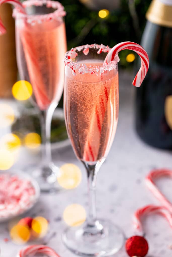 serving of Peppermint Mimosa for Holiday Mimosa Bar with candy cane garnish