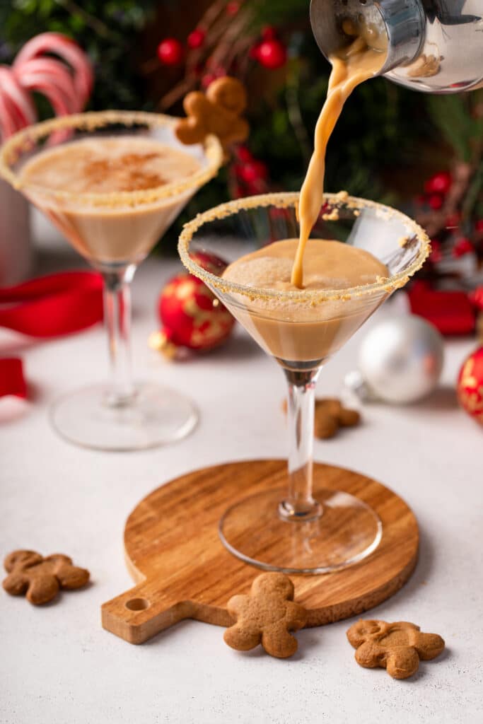 Pouring from cocktail shaker of The Perfect Gingerbread Martini