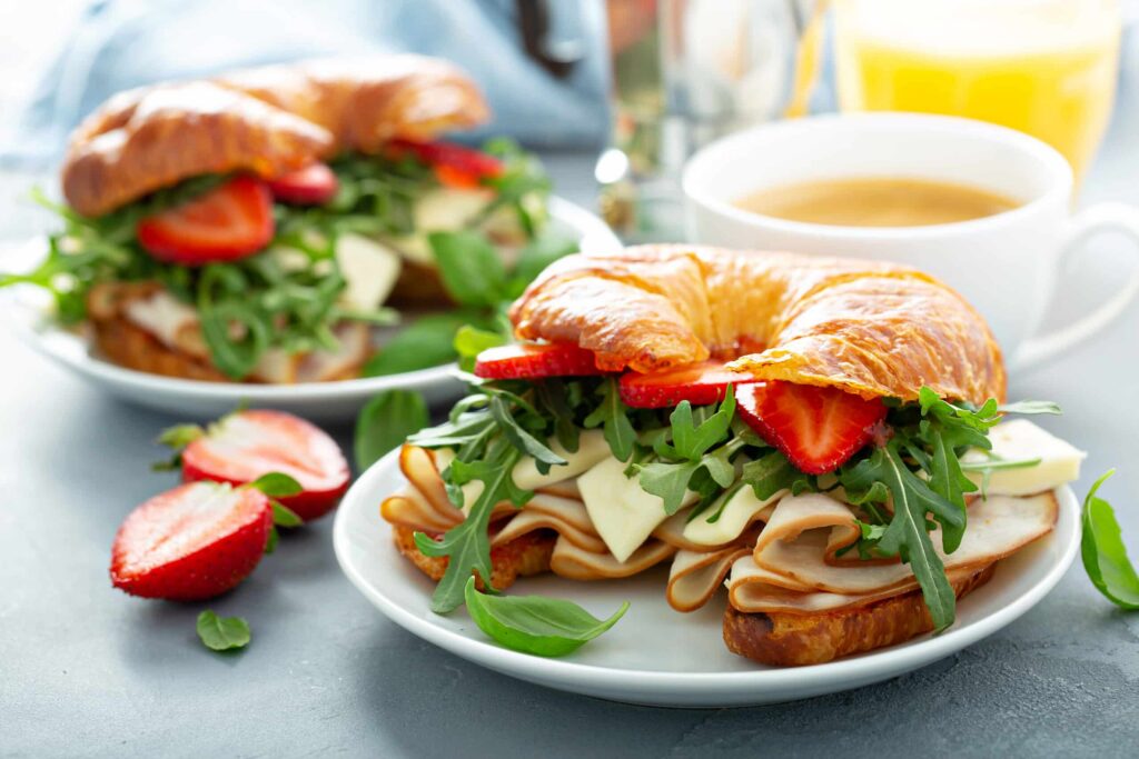 Serve with hot drinks Turkey Brie Croissant with Strawberries & Basil