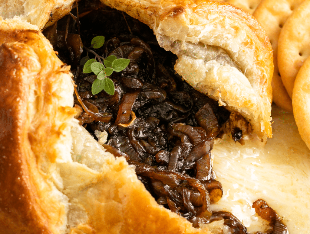 Baked Brie With Balsamic Caramelized Onions close up shot