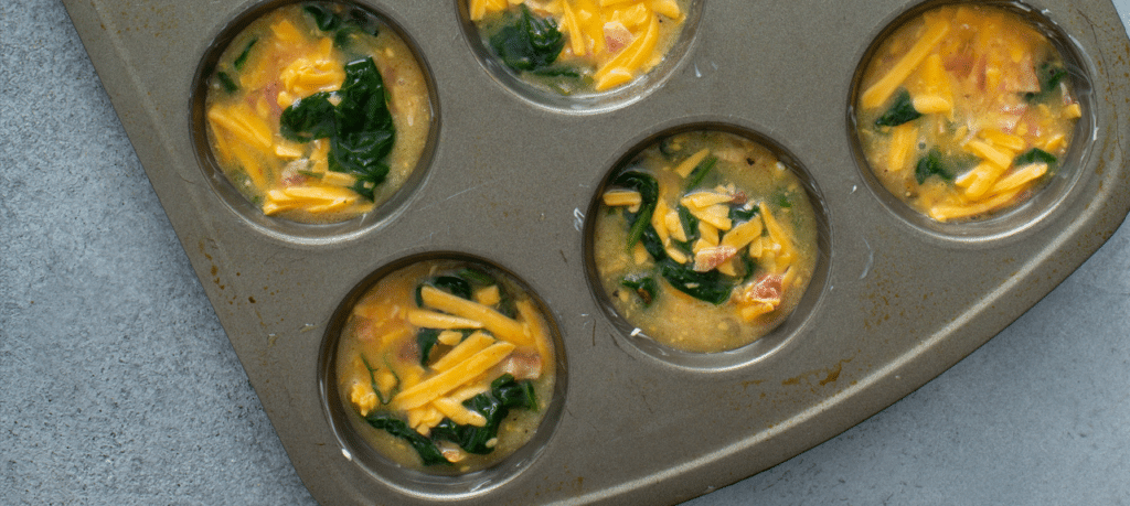 Folded mixture for Bacon Spinach & Cheese Egg Muffins
