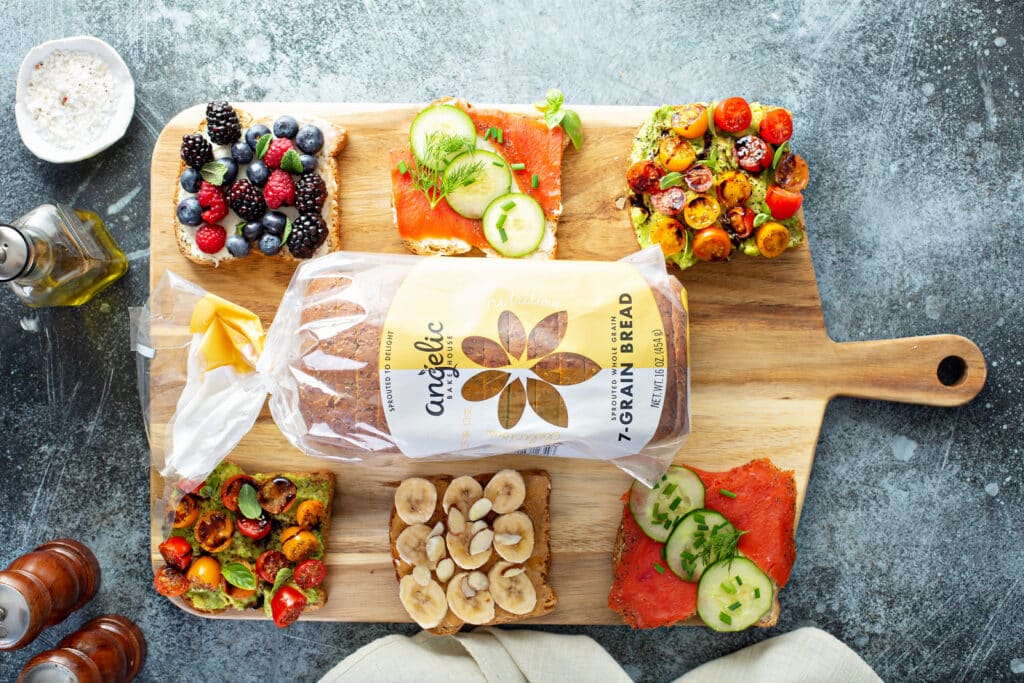 Almond Butter Banana Toast different toast variants served in wooden plate
