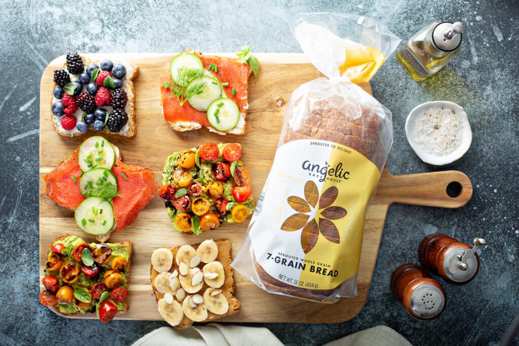 Almond Butter Banana Toast different toast variants served in wooden plate