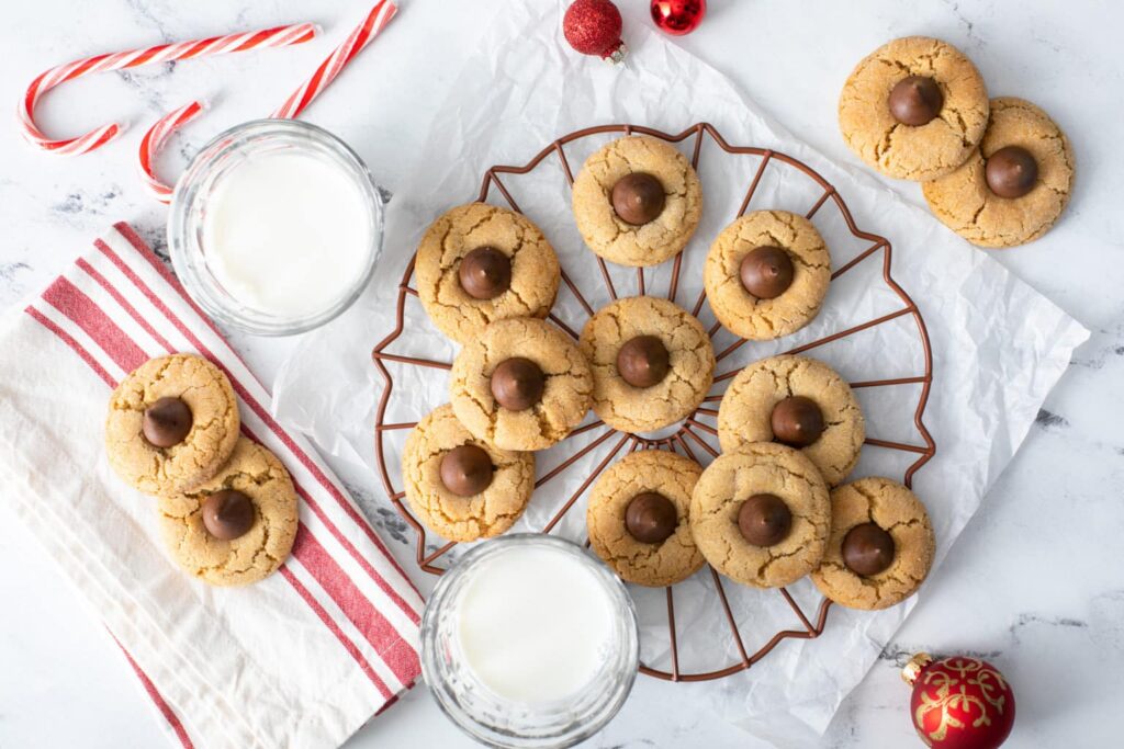 Peanut Butter Blossoms served in a holiday theme set up