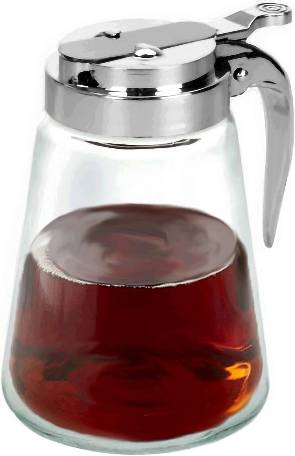 Glass syrup dispenser filled with maple syrup