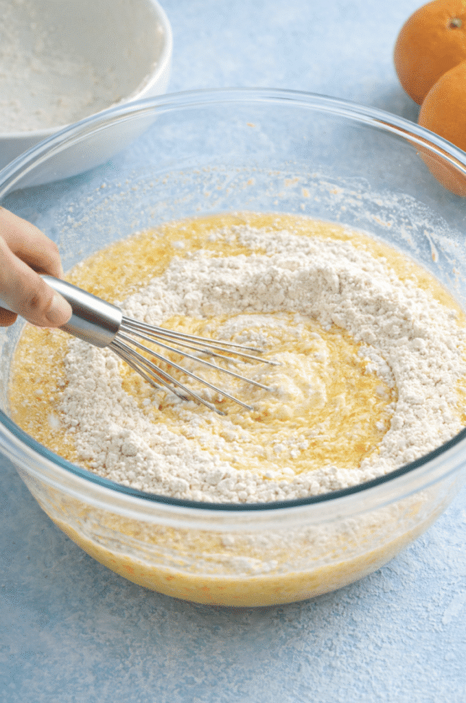 wet and dry ingredients mixed for Orange-Scented Olive Oil Bundt Cake