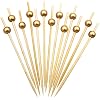 Gold-tipped bamboo cocktail picks fanned out