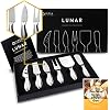 A six-piece stainless steel cheese knife set in its gift box