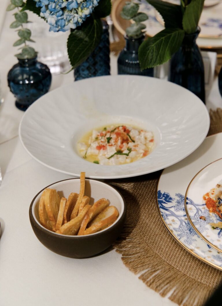 Kyma's Greek-style European sea bass ceviche with preserved lemon, jalapeño, tomato and mint, served with toasted bread at the Supper Club dinner