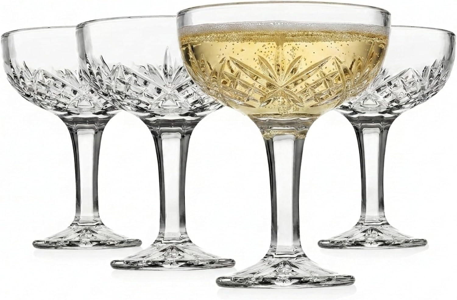 Set of crystal champagne coupes for New Year’s Eve toasts