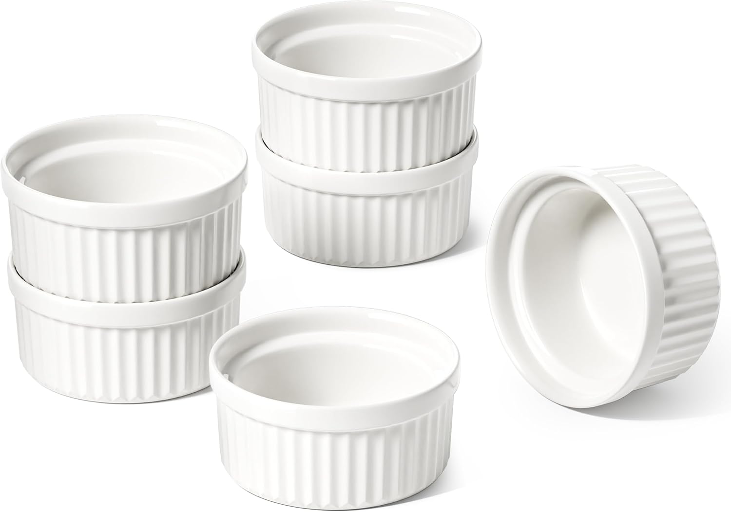 Set of small white fluted ceramic sauce cups