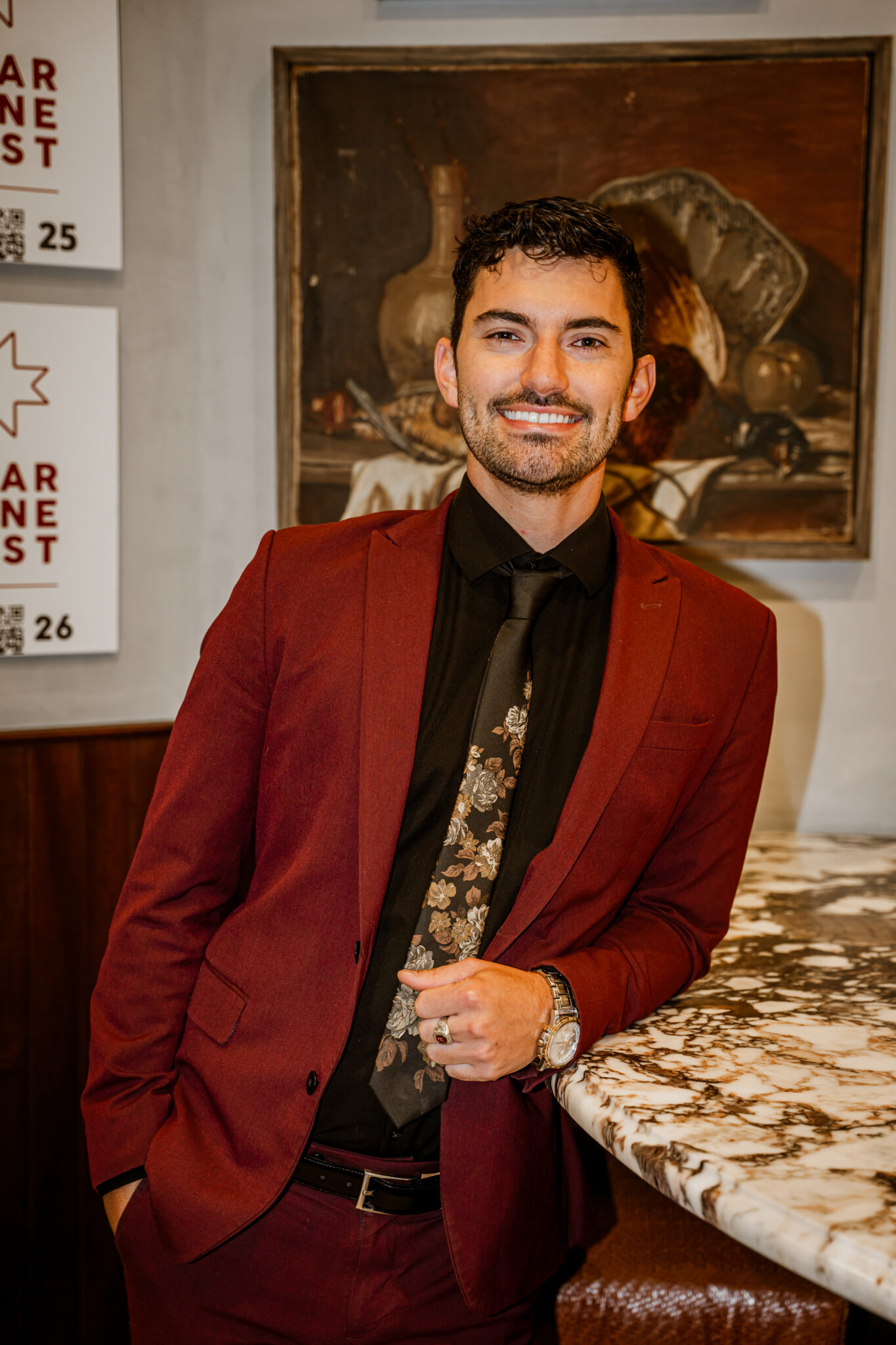 Jared Patterson, winner of the MICHELIN Outstanding Service Award, in a red jacket